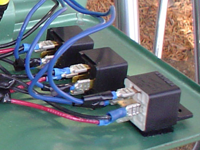 red wire (power) goes to battery; top pole (87) goes to lights; side poles go one side to switch and the other side to ground